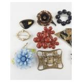 Various Base Metal Brooches.