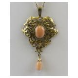 Lacy Art Nouveau Coral Gold Tone Base Metal Pendant Necklace .