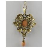 Lacy Art Nouveau Coral Gold Tone Base Metal Pendant Necklace .