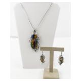 Abstract Enamel & Rhinestone Accented Silver Tone Base Metal Pendant Necklace & French Wire Earrings.