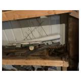 Assorted Scrap Pieces  Including Metal Pipes and Bicycle Wheels