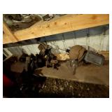 Collection of Used Automotive Parts Including Headlights and Radiator