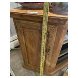 Wooden Entertainment Cabinet with Decorative Holiday Items