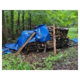 Stack of Firewood on Wooden Pallets