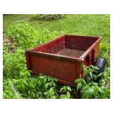 Used Red Metal Utility Trailer with Wheels