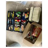 Collection of Fishing Lures and Equipment in Boxes