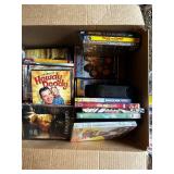 Mixed Media Collection of DVDs and CDs Featuring Movies and Music