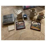 Collection of Vintage Decorative Items Including Plates, Tins, and Pitchers