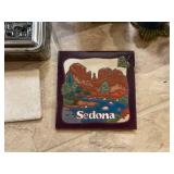 Collection of Vintage Decorative Items Including Plates, Tins, and Pitchers