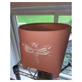 Collection of Garden Planters, Watering Cans, and Decorative Jars