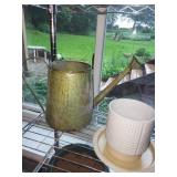 Collection of Garden Planters, Watering Cans, and Decorative Jars
