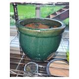 Collection of Garden Planters, Watering Cans, and Decorative Jars