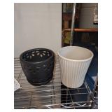 Collection of Garden Planters, Watering Cans, and Decorative Jars