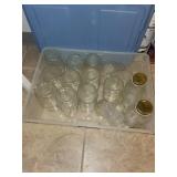 Collection of Mason Jars with Lids and Canning Supplies