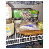 Collection of Mason Jars with Lids and Canning Supplies