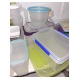 Assorted Kitchenware Collection Including Storage Containers and Baking Supplies