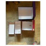 Assorted Items: Meditation Book, Mini Tripod, TEK Pouch, and Decorative Boxes