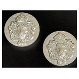 Two 2 Oz Silver Coins Featuring Lion Design