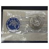1973 Eisenhower Uncirculated Silver Dollar and 1998 U.S. Mint Uncirculated Coin Sets (P and D)