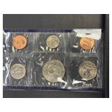 1973 Eisenhower Uncirculated Silver Dollar and 1998 U.S. Mint Uncirculated Coin Sets (P and D)