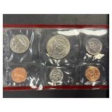 1973 Eisenhower Uncirculated Silver Dollar and 1998 U.S. Mint Uncirculated Coin Sets (P and D)