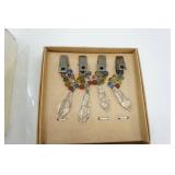 Cheese Knives, table cloth weights, and napkin rings