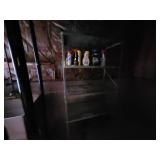 Industrial Metal Shelving Unit and Brown Filing Cabinet