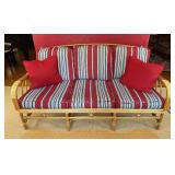 Vintage Bamboo Sofa with Red and Blue Striped Cushions