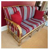 Vintage Bamboo Sofa with Red and Blue Striped Cushions