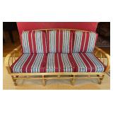 Vintage Bamboo Sofa with Red and Blue Striped Cushions
