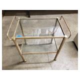 Metal cart with glass shelves