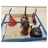 6 metal oiling cans