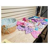 Basket full of doll clothes
