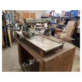 Antique DeWalt Radial alarm saw with wooden cabinet