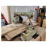 Antique DeWalt Radial alarm saw with wooden cabinet