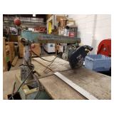 Antique DeWalt Radial alarm saw with wooden cabinet