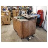 Antique DeWalt Radial alarm saw with wooden cabinet