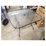 Glass top patio table