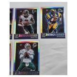 Lot of 7 Retro Series Prizm and Inserts Football Cards Featuring Barry Sanders, Brett Favre, Michael Vick, Eric Dickerson, John Randle, Randy Moss, and Dan Marino
