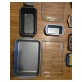 Collection of Baking Pans and Vintage Tin Signs