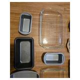 Collection of Baking Pans and Vintage Tin Signs