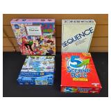 Collection of Board Games and a Dinosaur Mask