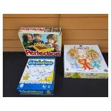 Collection of Board Games and a Dinosaur Mask