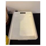 Assorted Household Items Including Storage Baskets and Toys