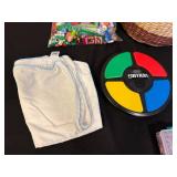 Assorted Household Items Including Storage Baskets and Toys