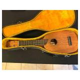 Ukulele with Vintage Case, President William J. Clinton Talking Figure, and 4 DVDs