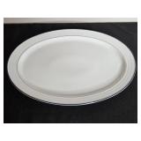 Assorted Serving Platters and Trays by Andrea by Sadek, Ian Logan, and Crate & Barrel