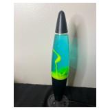 Collection of Decorative Items: Lava Lamp, Pusheen Plush, and more.