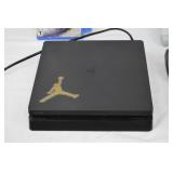 PlayStation 4 with 2 Games and 3 Remotes