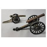2-Vintage  Canons. 1 is a Vintage Mini Cast Iron/Brass Canon Replica Stones River Battlefield. 5" Long 3 inches wide and 2 1/2 inches tall. The other is a precast canon.  Made in the 60